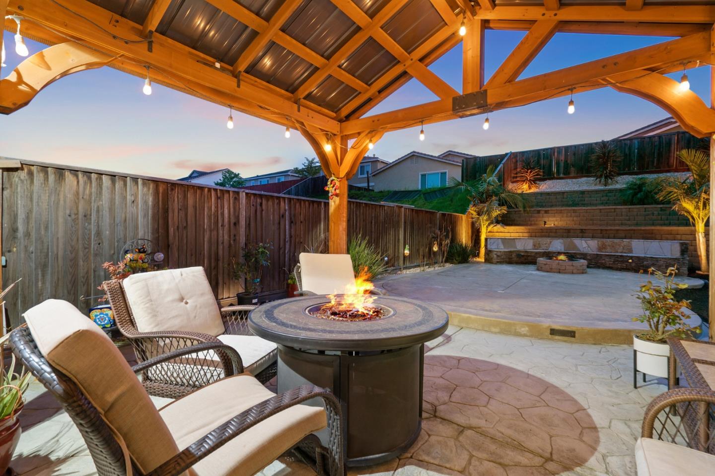 2448 Vallarta Drive Bay Point, CA 94565 - Photo 52 of 52 a patio with a table and chairs