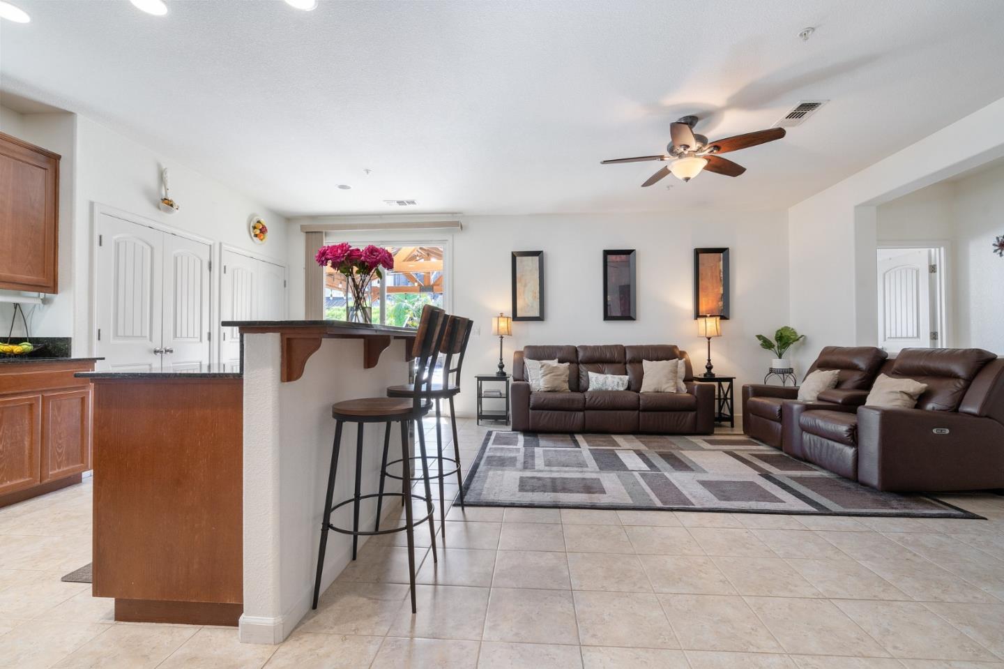 2448 Vallarta Drive Bay Point, CA 94565 - Photo 7 of 52 a living room with furniture and a chandelier