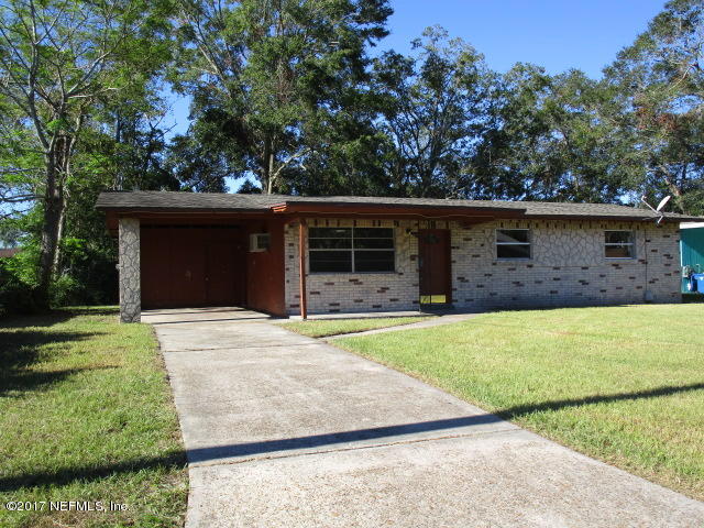 6912 Corday Road Jacksonville, FL 32208 - Photo 10 of 10 front view of a house with a yard