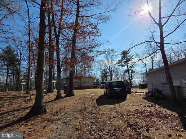 a view of a park with trees