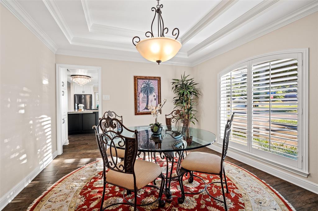 400 Hunters Ridge Circle Coppell, TX 75019 - Photo 4 of 35 a dining room with furniture and window