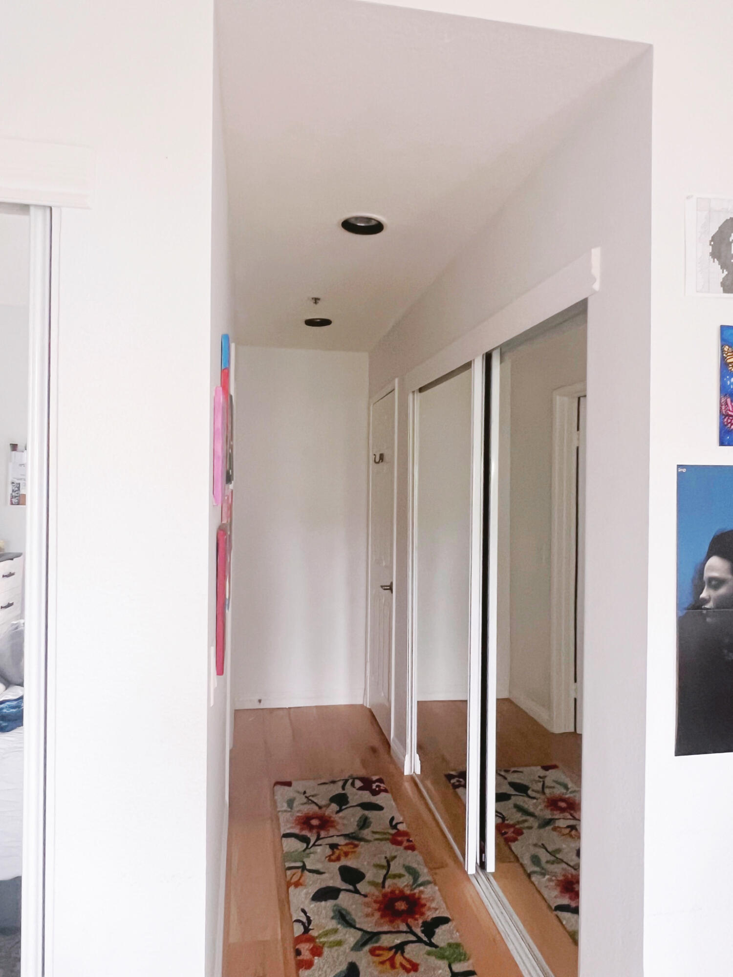 20371 Bluffside Circle, Unit B404 Huntington Beach, CA 92646 - Photo 16 of 40 a walk in closet with wooden floor