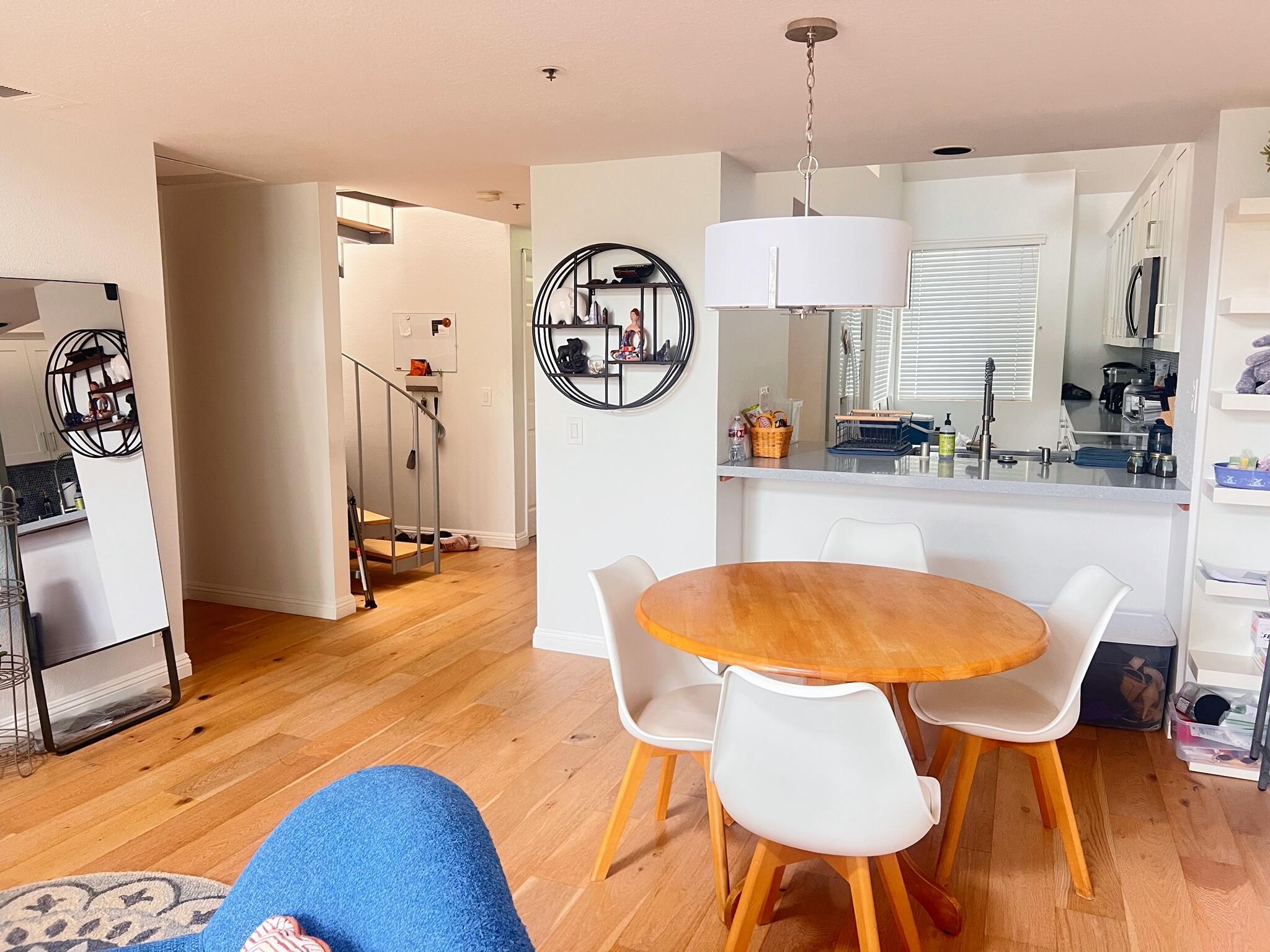 20371 Bluffside Circle, Unit B404 Huntington Beach, CA 92646 - Photo 8 of 40 a view of a dining room with furniture
