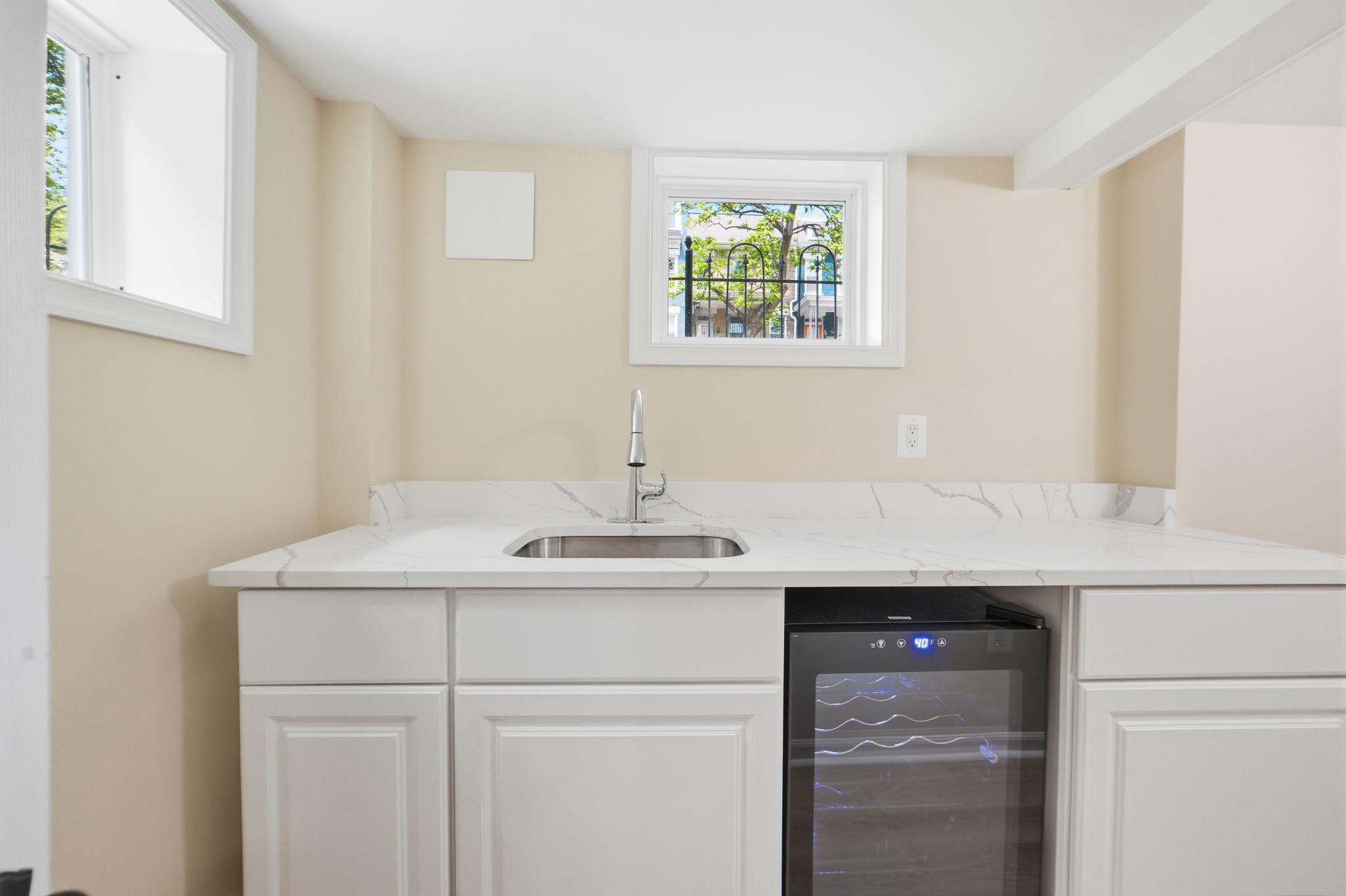518 Columbia Road Northwest Washington, DC 20001 - Photo 26 of 35 Charming kitchenette with natural light.