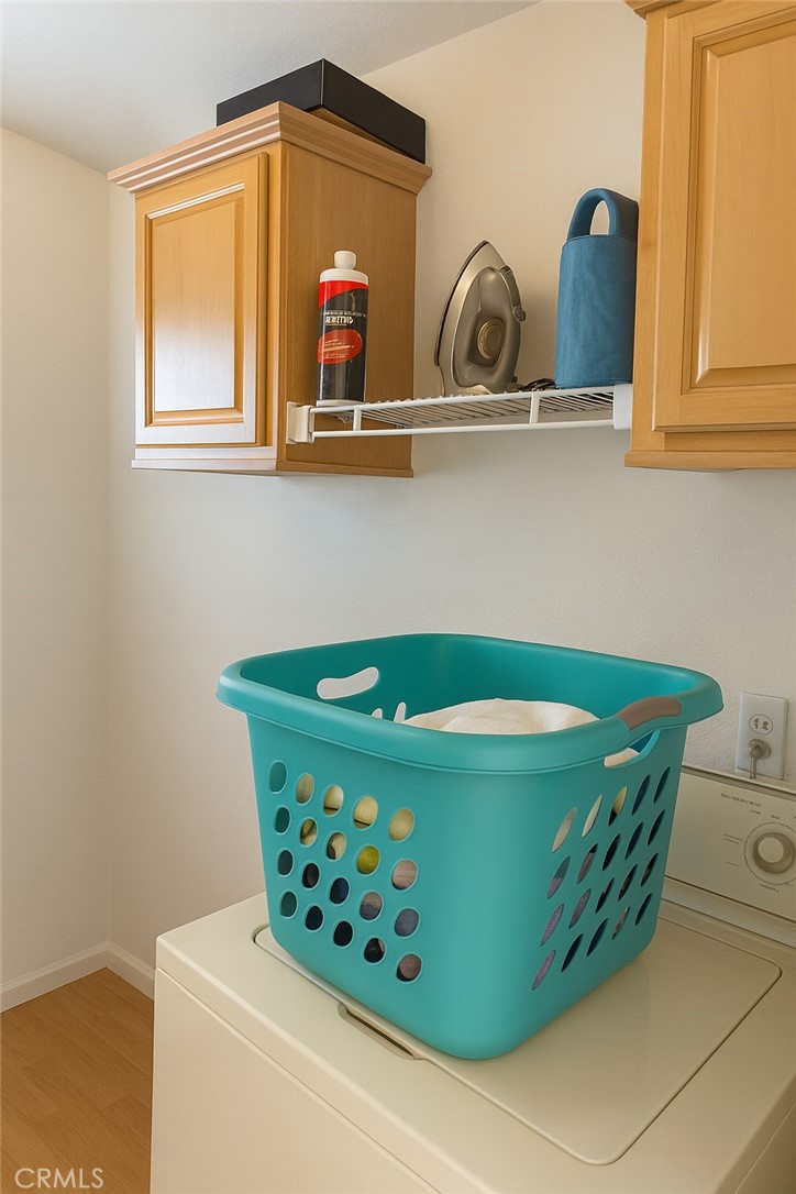 13130 Evergreen Road Pinon Hills, CA 92372 - Photo 12 of 22 a room with cabinets and dust bin