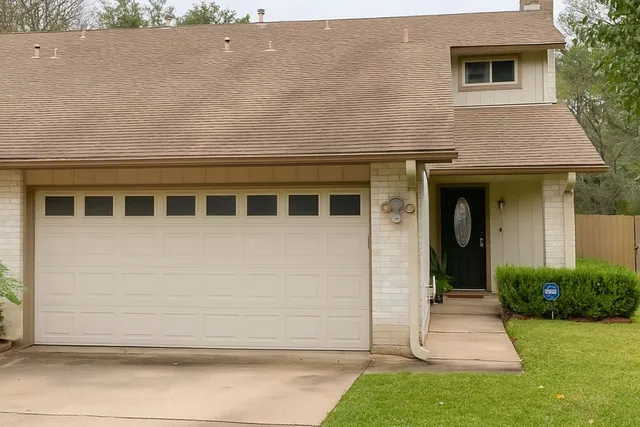 a house view with a backyard space
