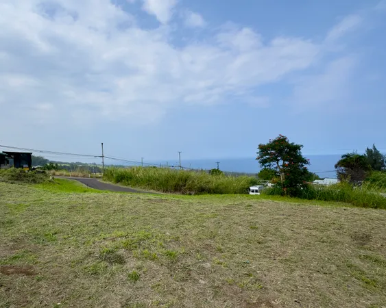 a view of a lake with a big yard