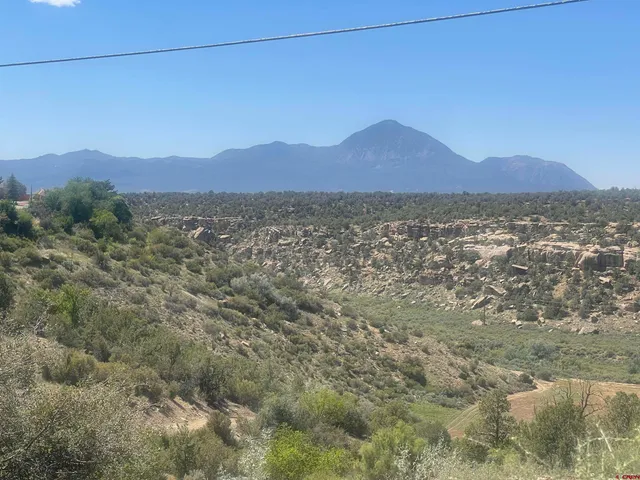 a view of a city with mountain