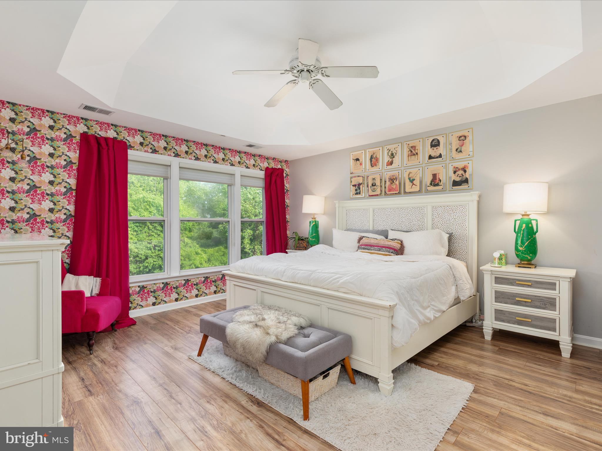 20636 Muddy Harbor Square Sterling, VA 20165 - Photo 12 of 41 a bedroom with a bed and a window