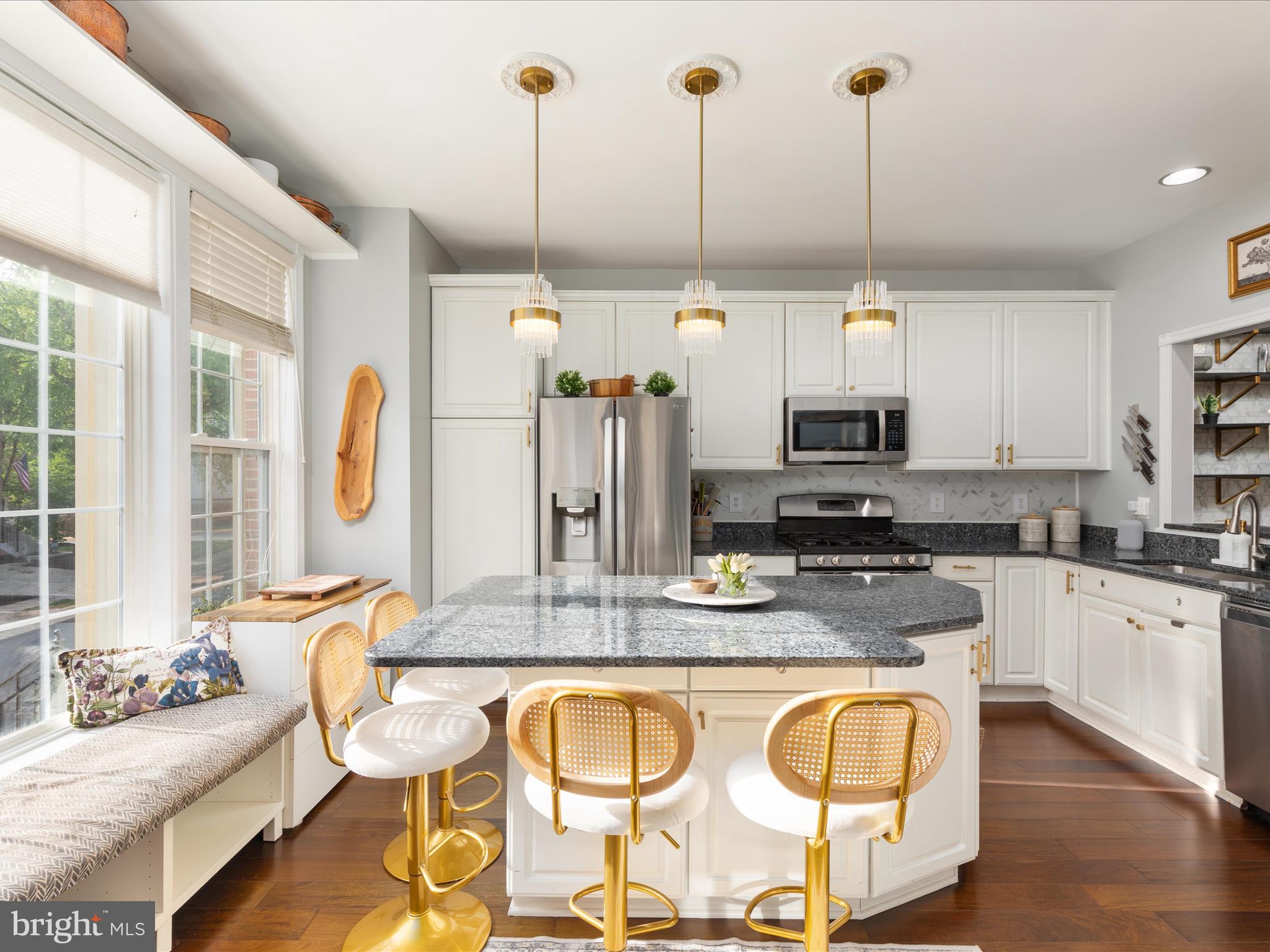 20636 Muddy Harbor Square Sterling, VA 20165 - Photo 2 of 41 a kitchen with stainless steel appliances granite countertop a stove a sink and a granite counter tops