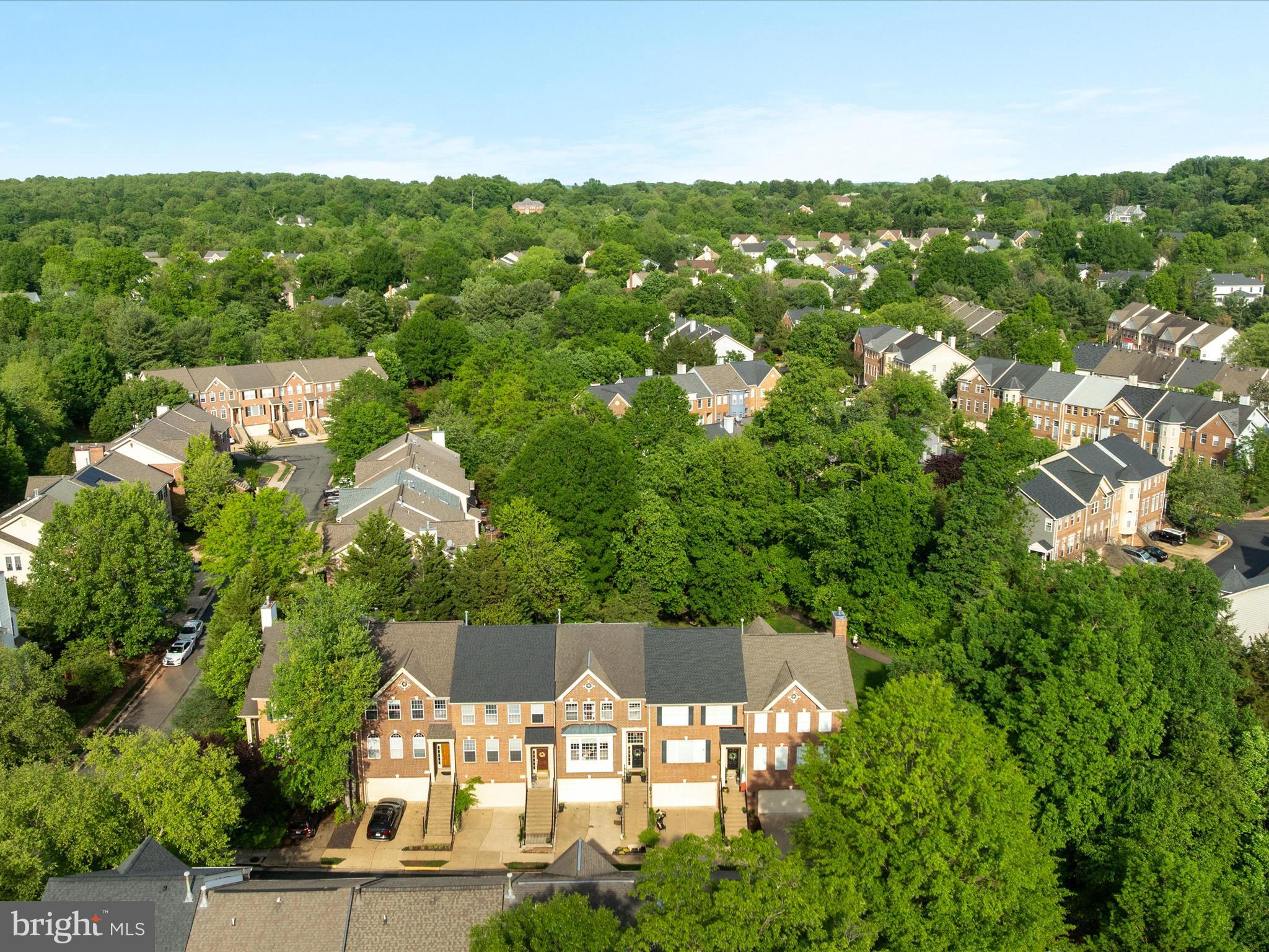 20636 Muddy Harbor Square Sterling, VA 20165 - Photo 31 of 41 an aerial view of residential houses with outdoor space and trees