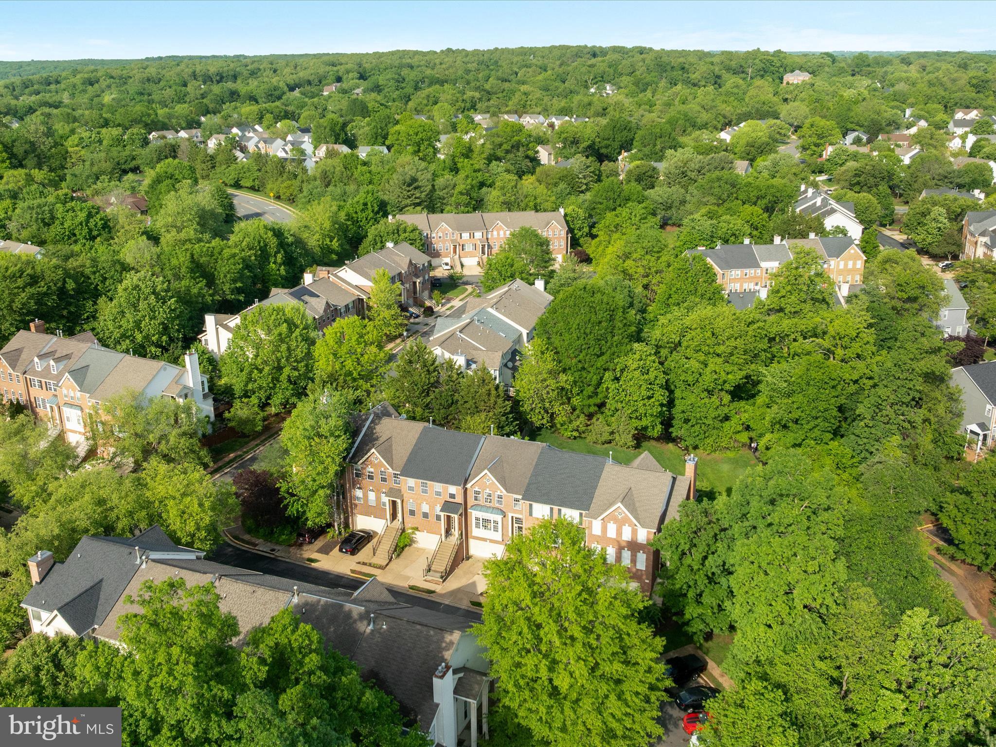 20636 Muddy Harbor Square Sterling, VA 20165 - Photo 33 of 41 an aerial view of a house with a yard