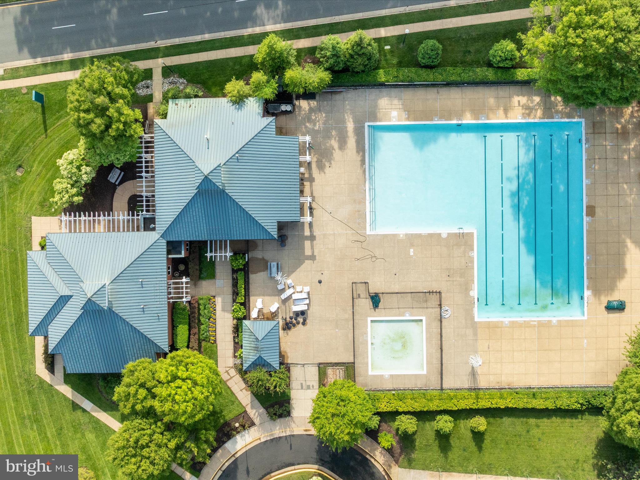 20636 Muddy Harbor Square Sterling, VA 20165 - Photo 37 of 41 an aerial view of a house with garden space and a patio