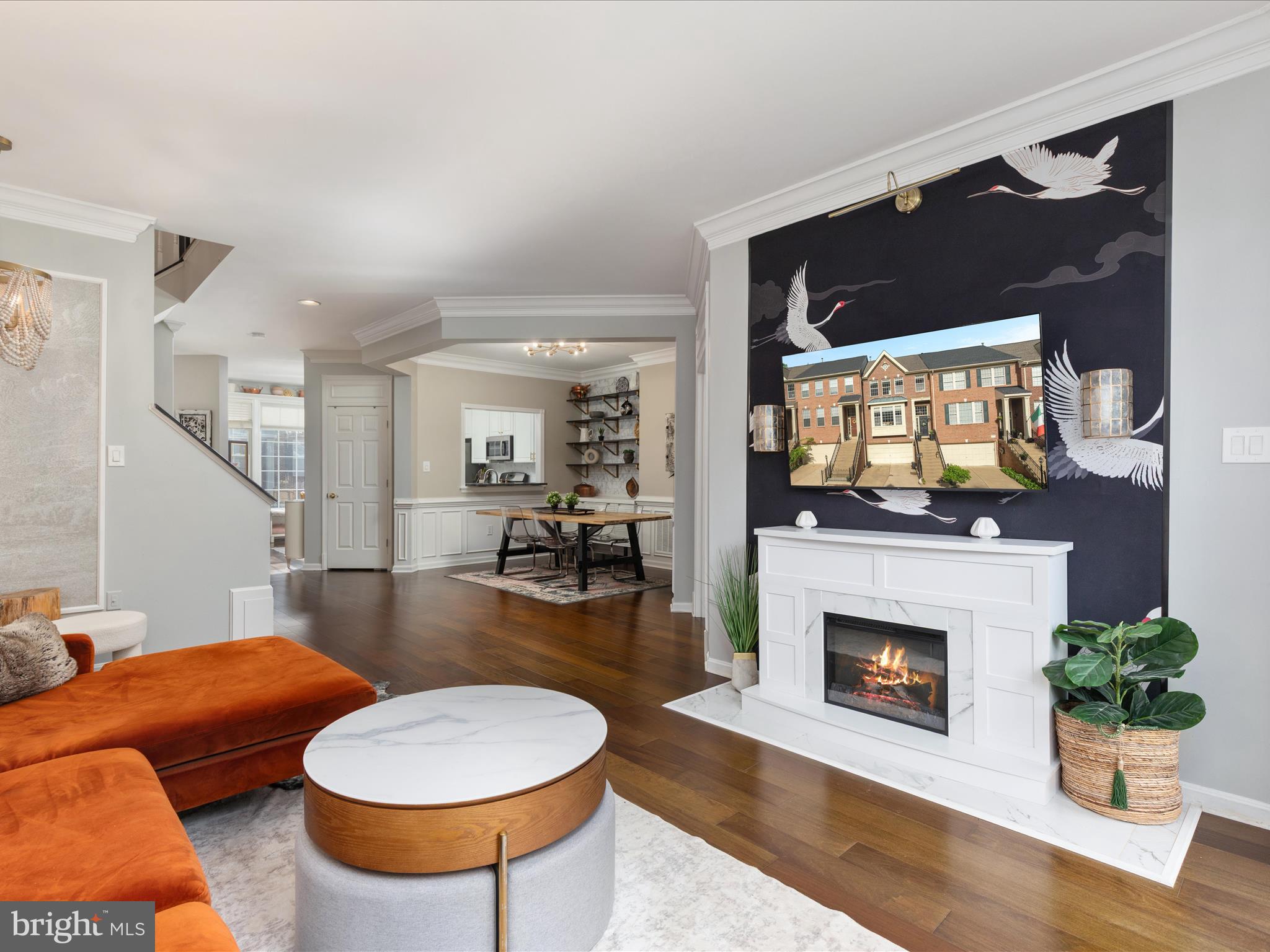 20636 Muddy Harbor Square Sterling, VA 20165 - Photo 9 of 41 a living room with furniture and a fireplace