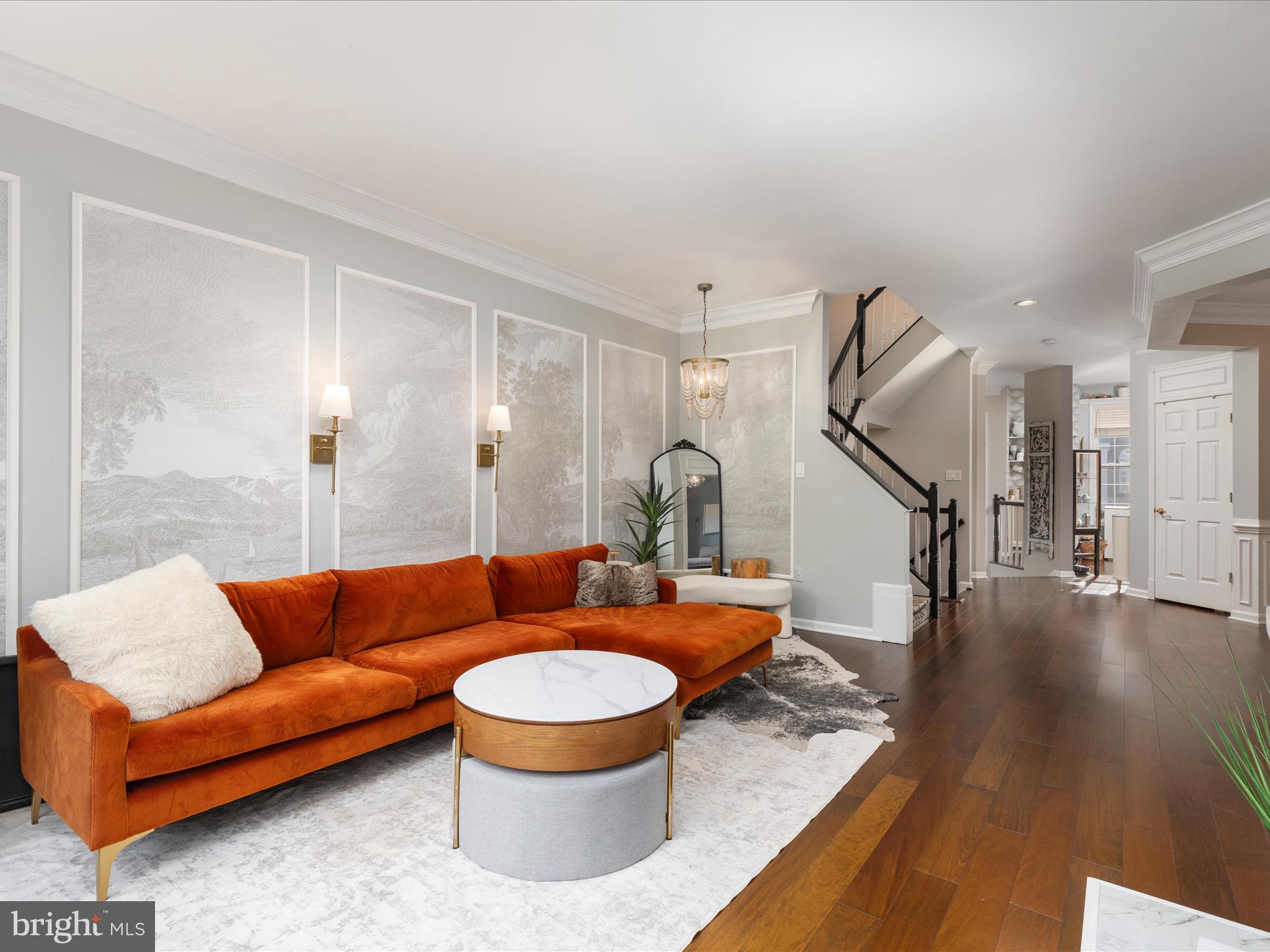 20636 Muddy Harbor Square Sterling, VA 20165 - Photo 10 of 41 a living room with furniture a rug and a wooden floor