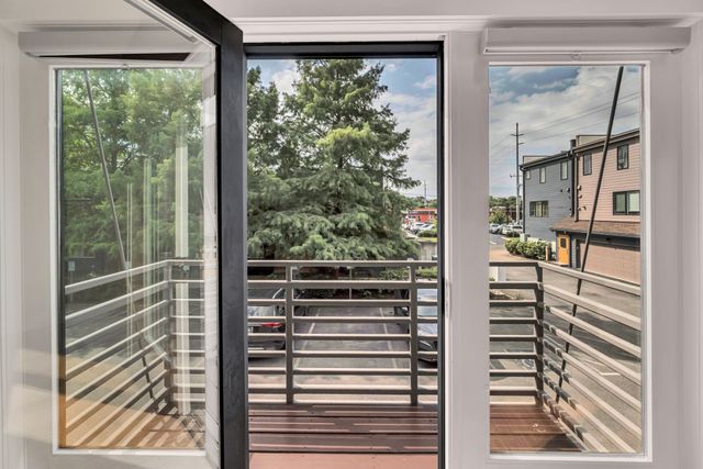 a kitchen that has a sink and a stove