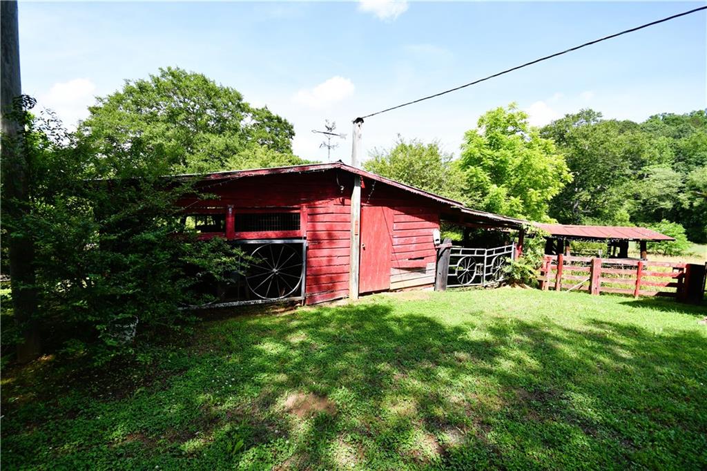 400 Kelley Road Tallapoosa, GA 30176 - Photo 13 of 52 a front view of a house with garden