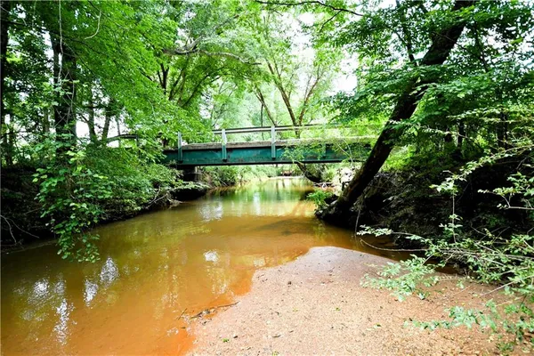 a view of a yard with an outdoor space and deck view