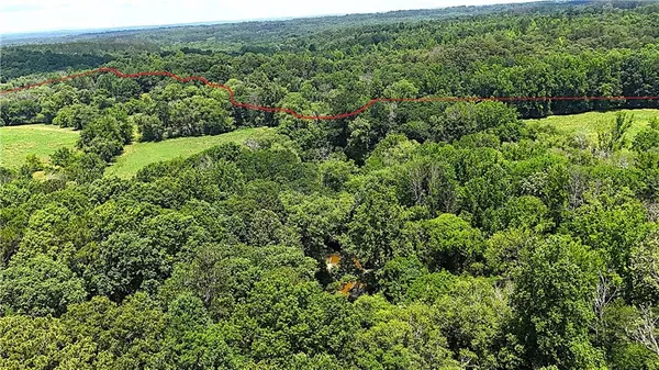 a view of a golf course with a lake