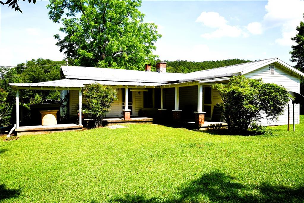 400 Kelley Road Tallapoosa, GA 30176 - Photo 10 of 52 a view of a house with a yard and sitting area