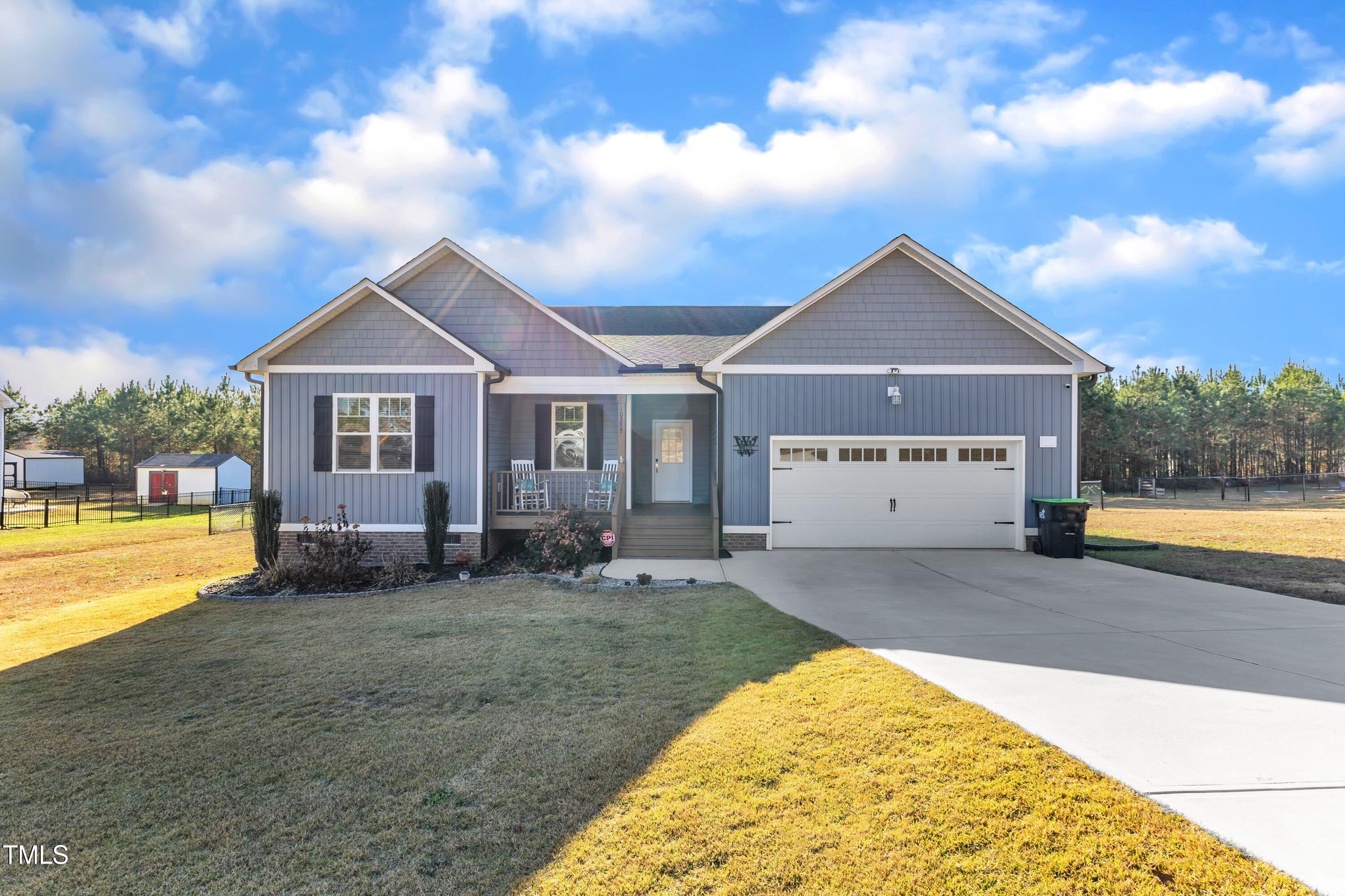 10387 Claude Lewis Road Middlesex, NC 27557 - Photo 1 of 37 a view of a house with swimming pool and a yard
