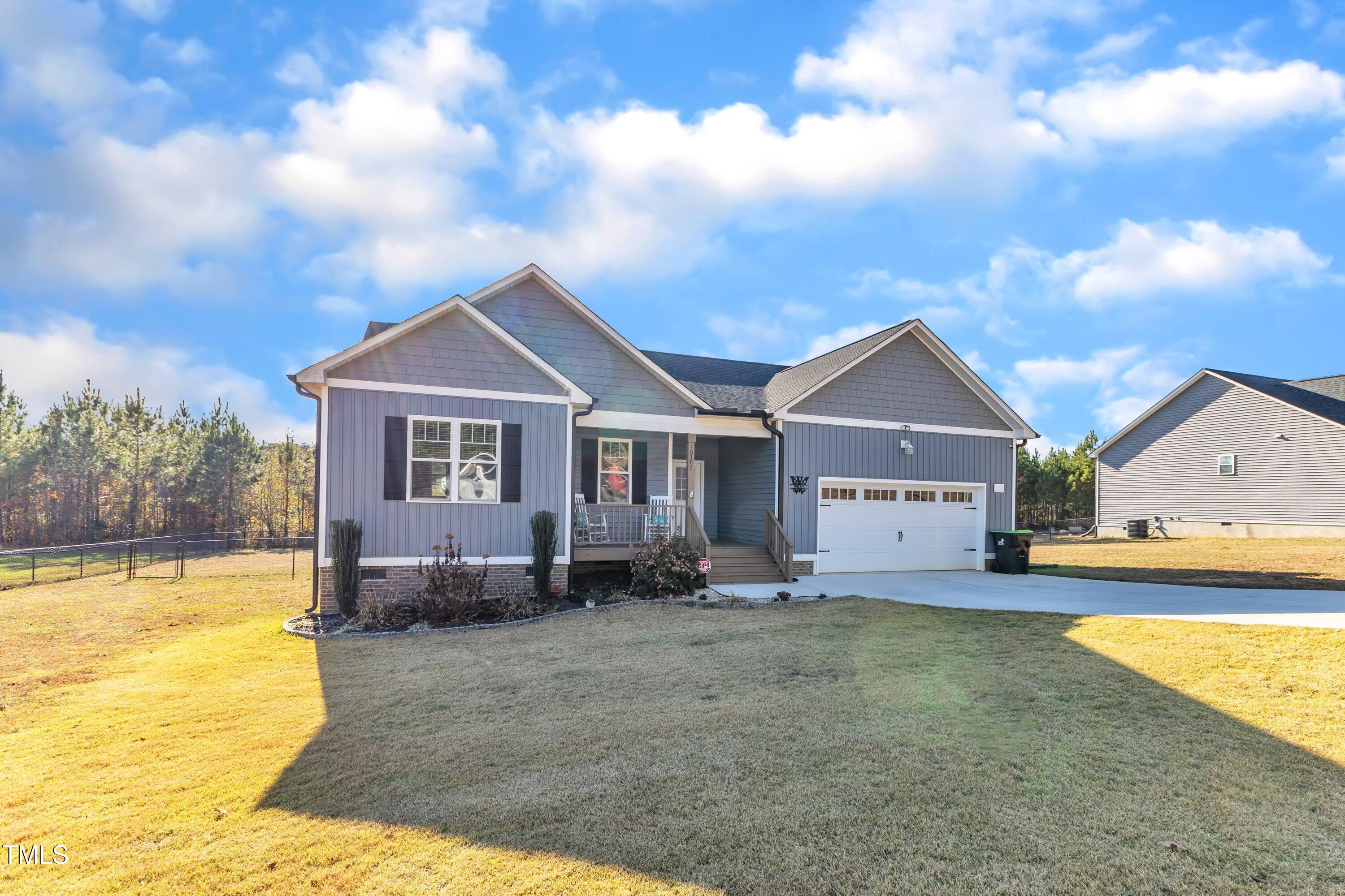 10387 Claude Lewis Road Middlesex, NC 27557 - Photo 2 of 37 a view of a house with a yard
