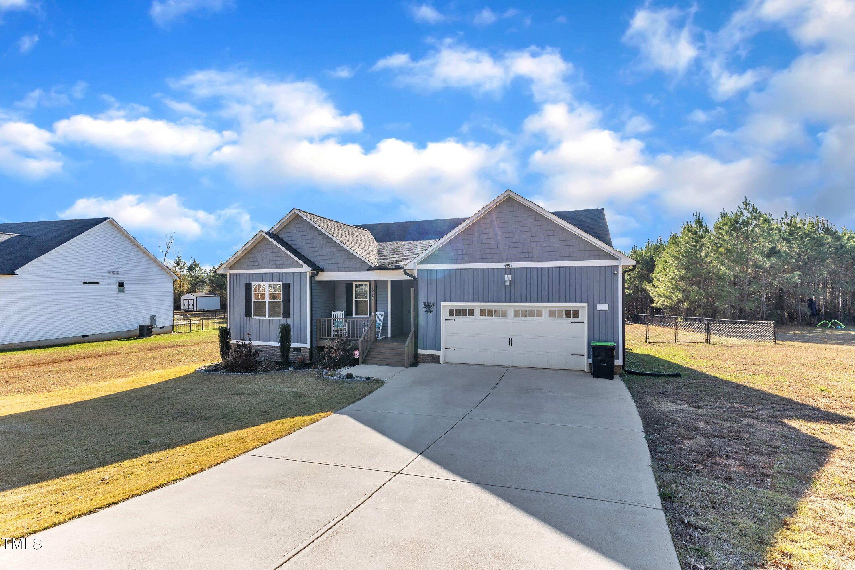 10387 Claude Lewis Road Middlesex, NC 27557 - Photo 3 of 37 a front view of a house with yard