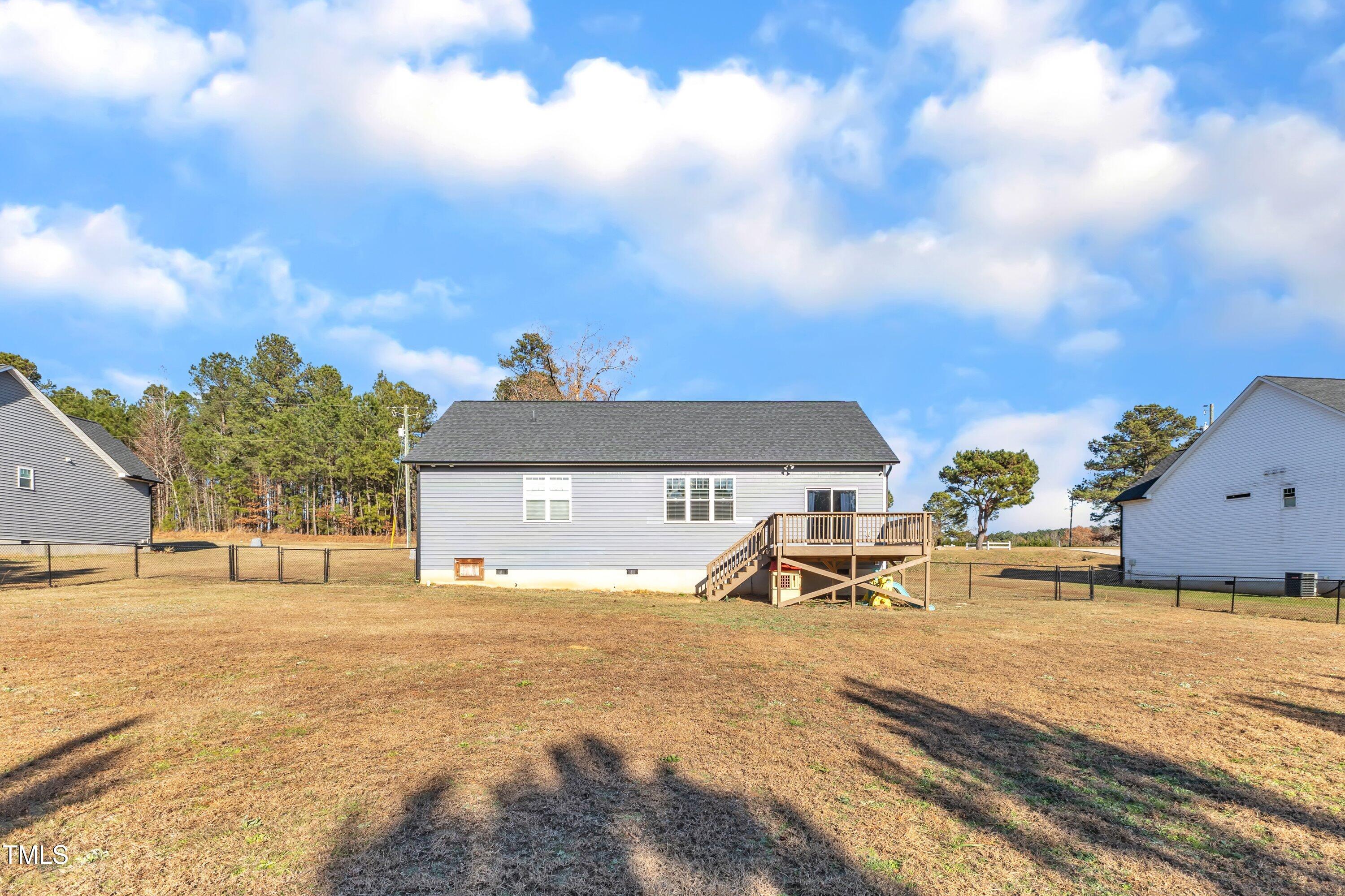 10387 Claude Lewis Road Middlesex, NC 27557 - Photo 34 of 37 a view of a house with snow on the background