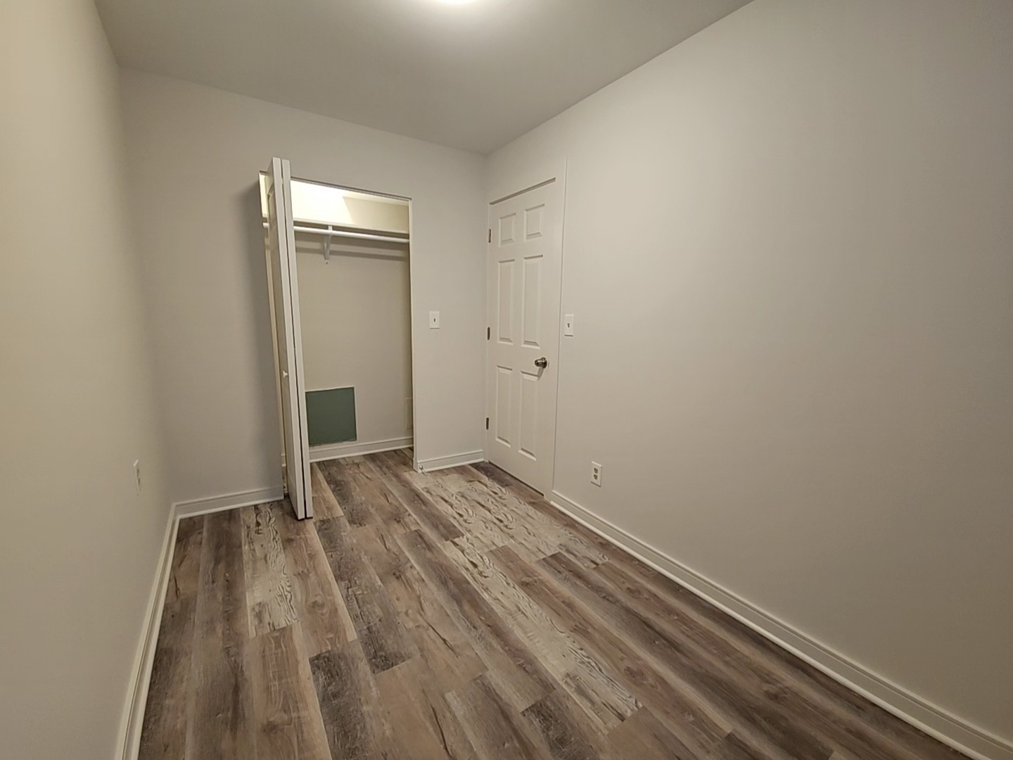 2216 West 21st Place, Unit 1F Chicago, IL 60608 - Photo 12 of 15 a view of a room with wooden floor and a sink