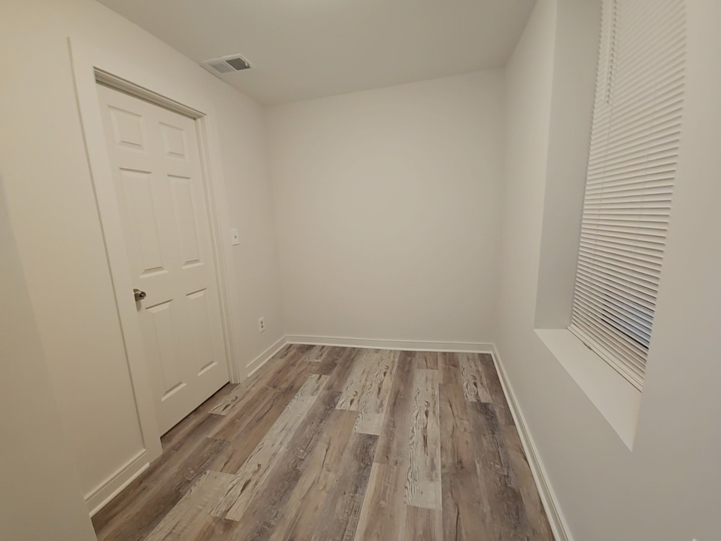 2216 West 21st Place, Unit 1F Chicago, IL 60608 - Photo 14 of 15 a view of wooden floor in a bathroom
