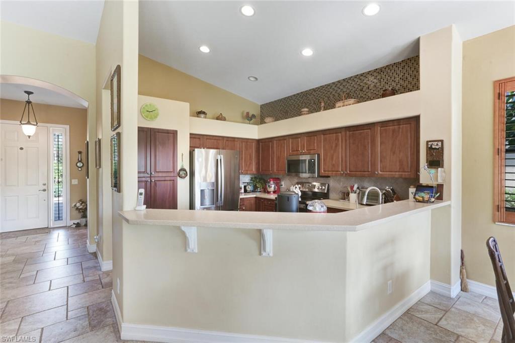 20871 Torrey Pines Way Estero, FL 33928 - Photo 13 of 43 a view of a living room and chandelier