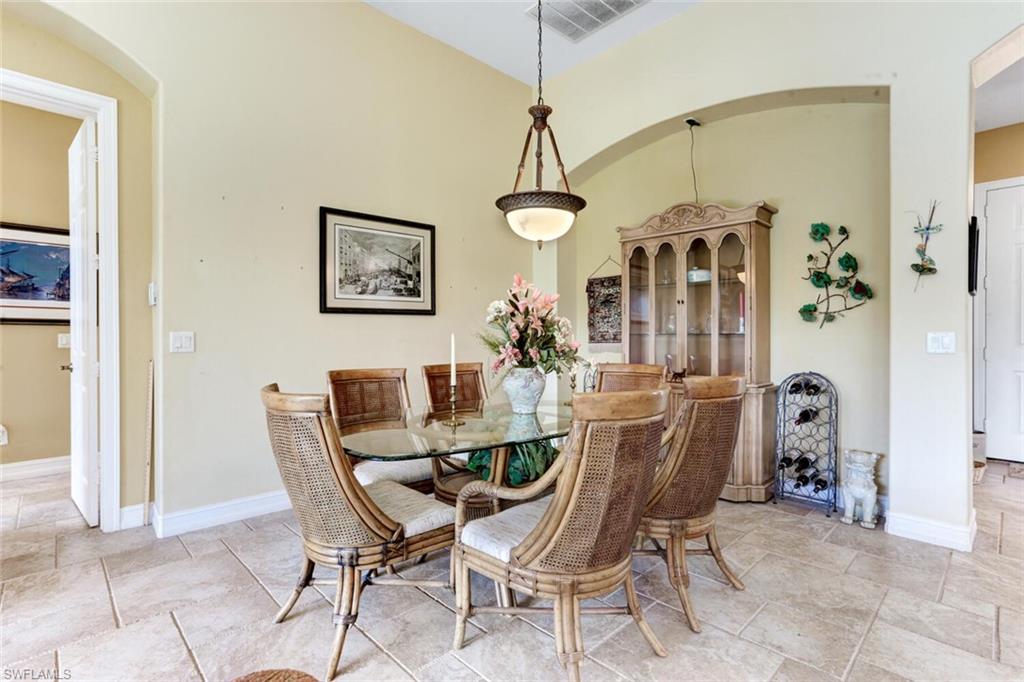 20871 Torrey Pines Way Estero, FL 33928 - Photo 17 of 43 a dining room with furniture and window