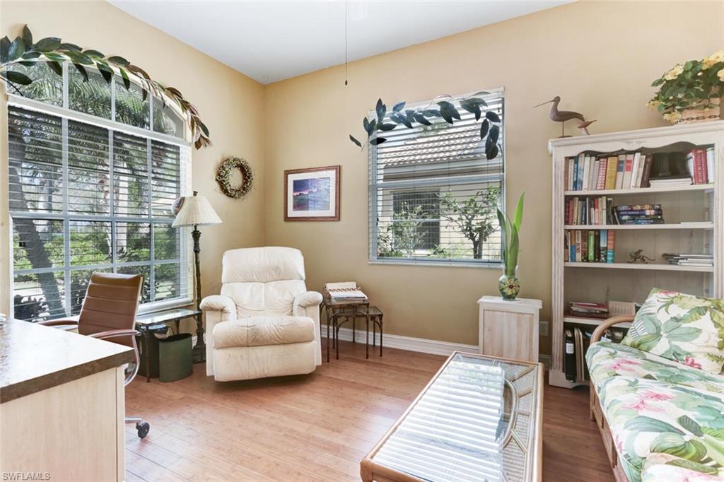 20871 Torrey Pines Way Estero, FL 33928 - Photo 28 of 43 a living room with furniture and a large window