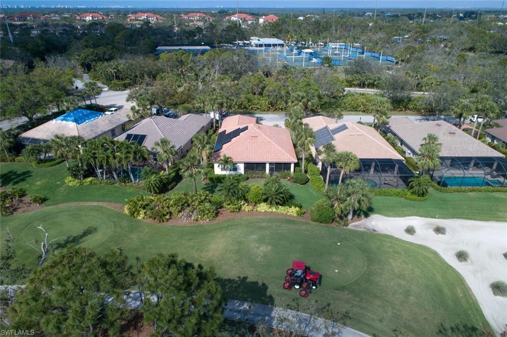20871 Torrey Pines Way Estero, FL 33928 - Photo 8 of 43 an aerial view of a house with a garden