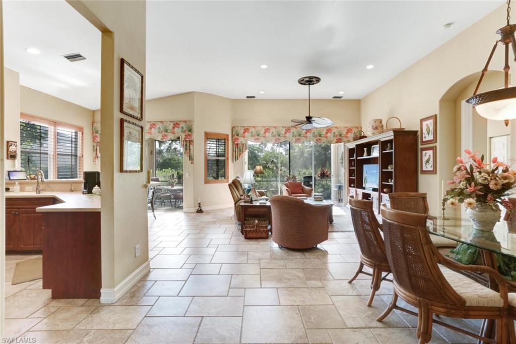 20871 Torrey Pines Way Estero, FL 33928 - Photo 9 of 43 a view of a dining room with furniture