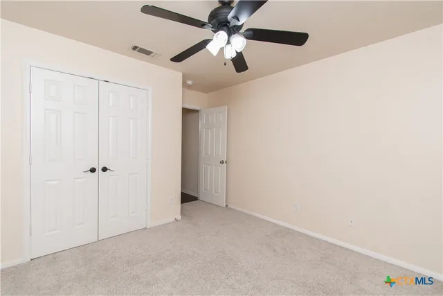 a bathroom with a shower sink vanity and a mirror