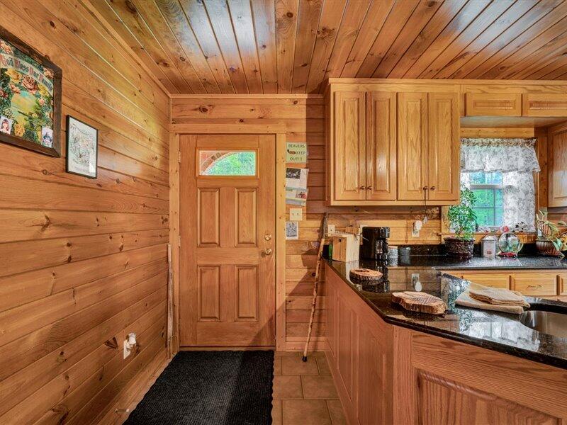 2628 Republican Church Road Ferrum, VA 24088 - Photo 8 of 23 a kitchen with a sink and cabinets