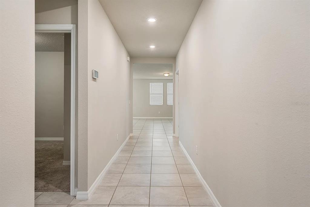 1274 Citrus Landings Boulevard Davenport, FL 33837 - Photo 7 of 20 a view of a hallway