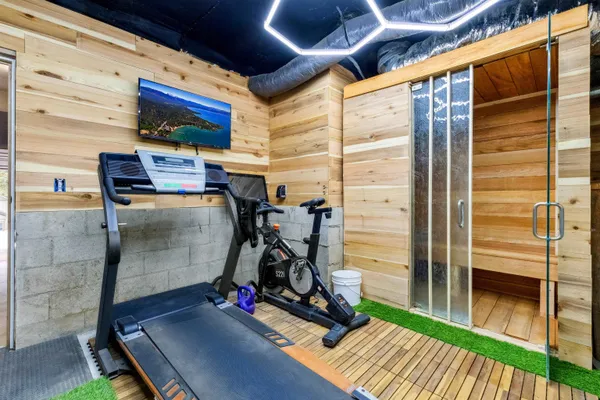 a view of a room with gym equipment