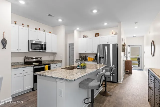 $309,000 | 494 Ladyfish Loop Northwest, Sunset Beach, NC 28468