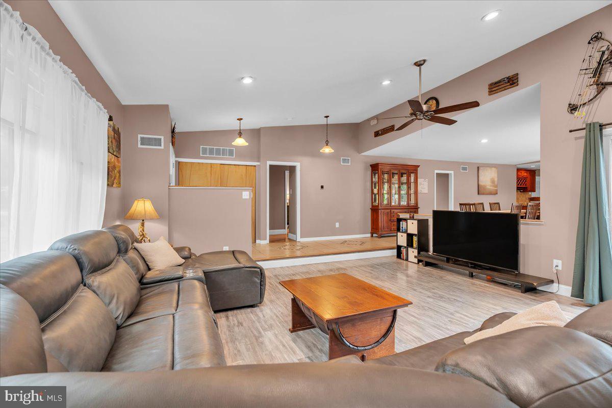 64 Blue Anchor Road Sicklerville, NJ 08081 - Photo 8 of 47 a living room with furniture a air conditioner and a table