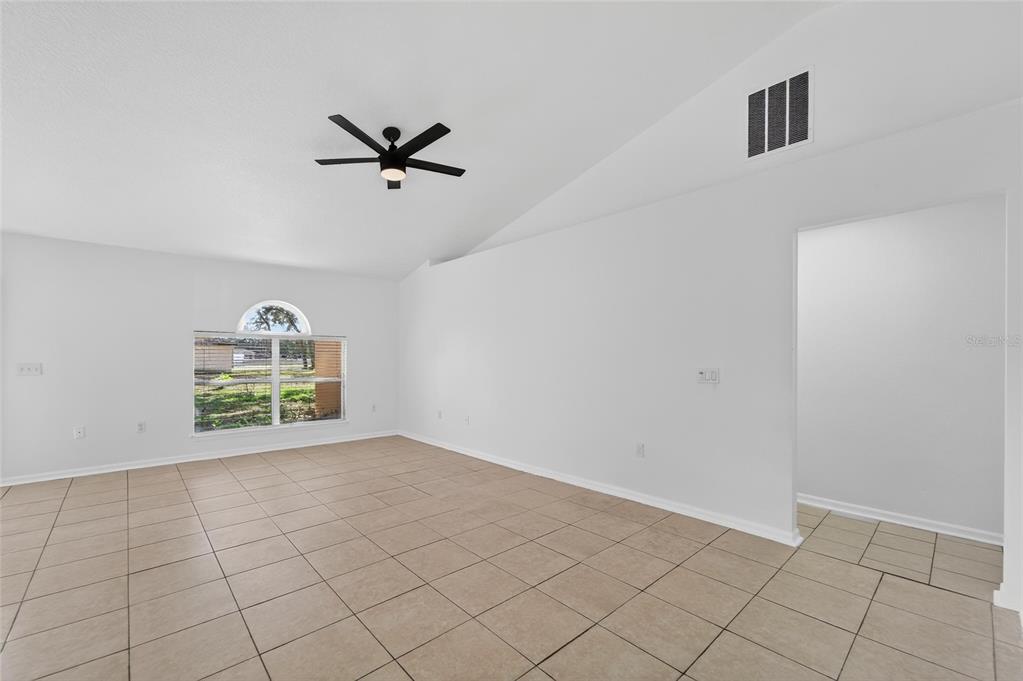 9010 Mc Cormick Street Spring Hill, FL 34608 - Photo 19 of 73 a view of an empty room and window
