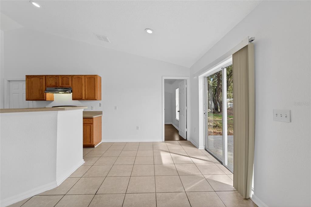 9010 Mc Cormick Street Spring Hill, FL 34608 - Photo 26 of 73 a view of a kitchen with a sink and a stove top oven