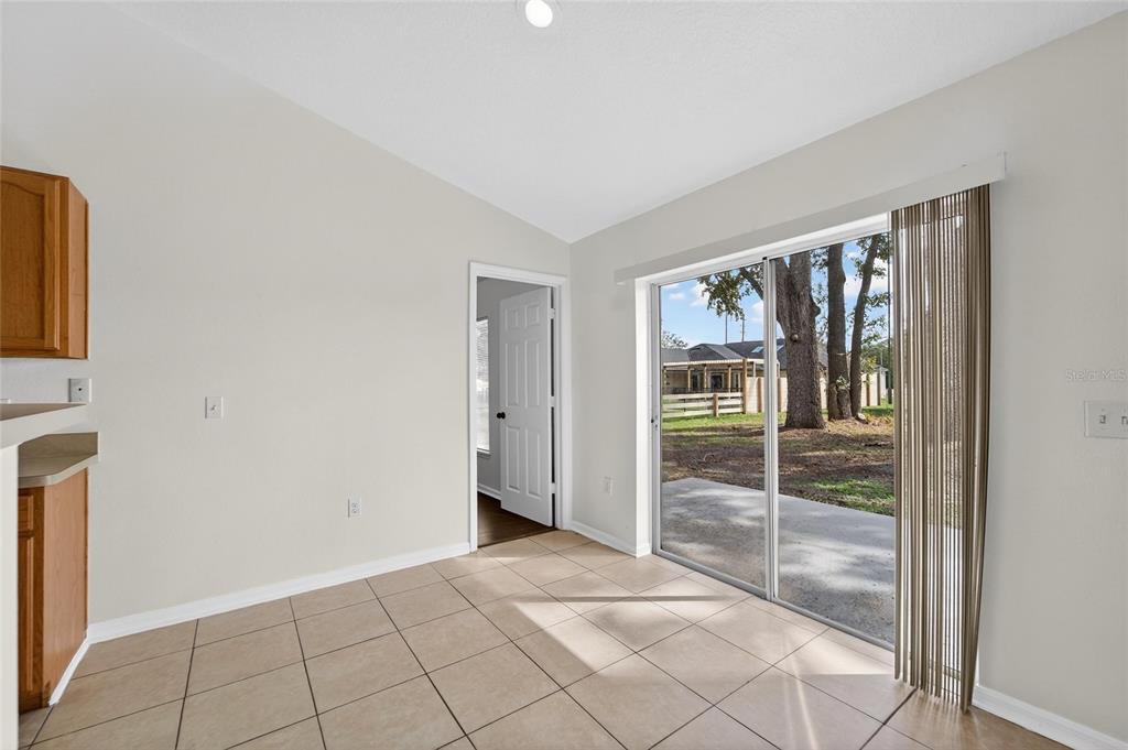 9010 Mc Cormick Street Spring Hill, FL 34608 - Photo 27 of 73 a view of an empty room with window
