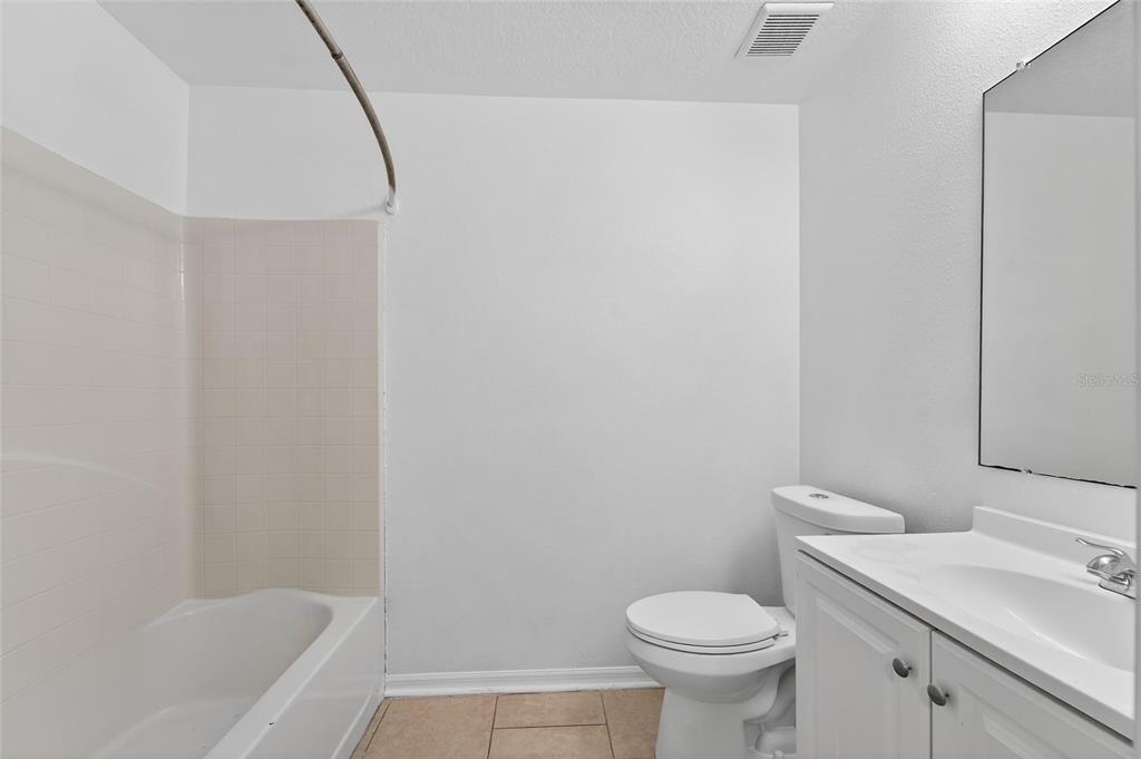 9010 Mc Cormick Street Spring Hill, FL 34608 - Photo 59 of 73 a bathroom with a sink and a toilet