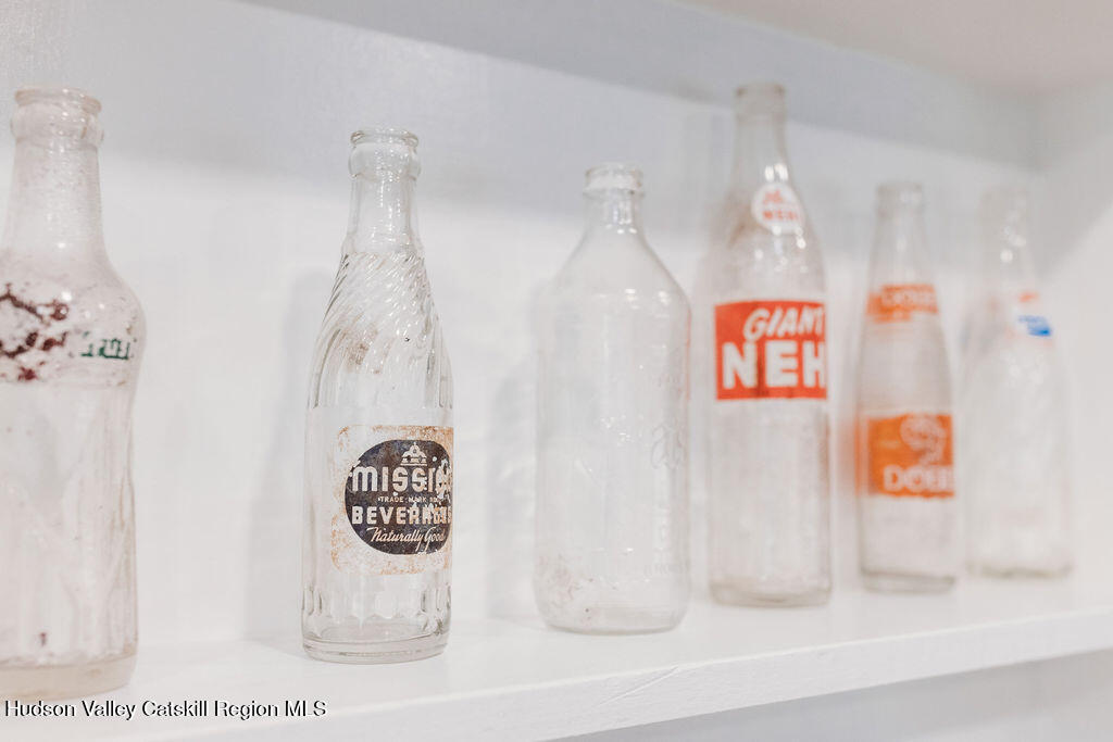 4028 County Rte 26 Greenville, NY 12083 - Photo 17 of 51 a bathroom with a shower curtain and a sink