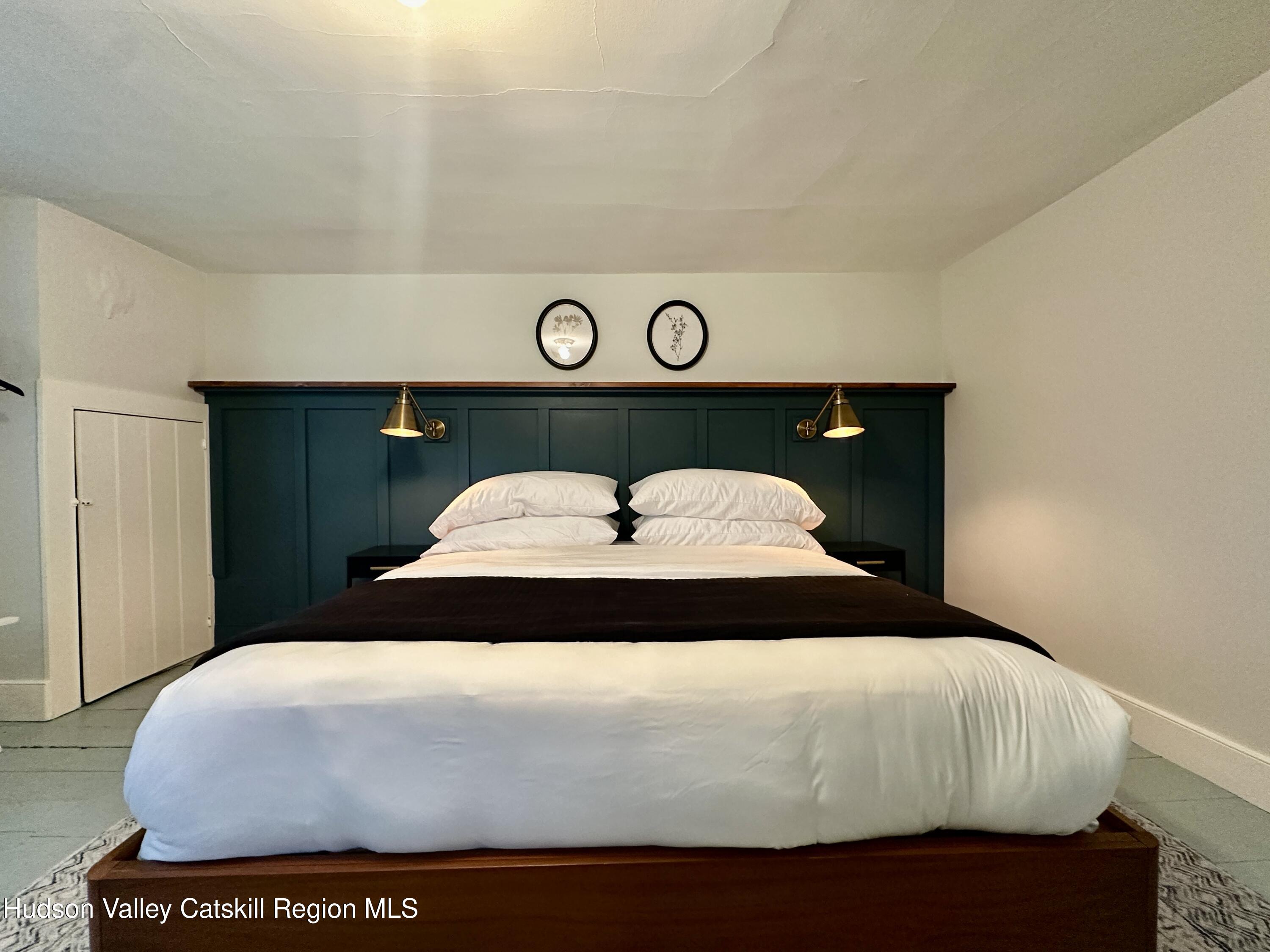 4028 County Rte 26 Greenville, NY 12083 - Photo 21 of 51 a bedroom with a bed and a table