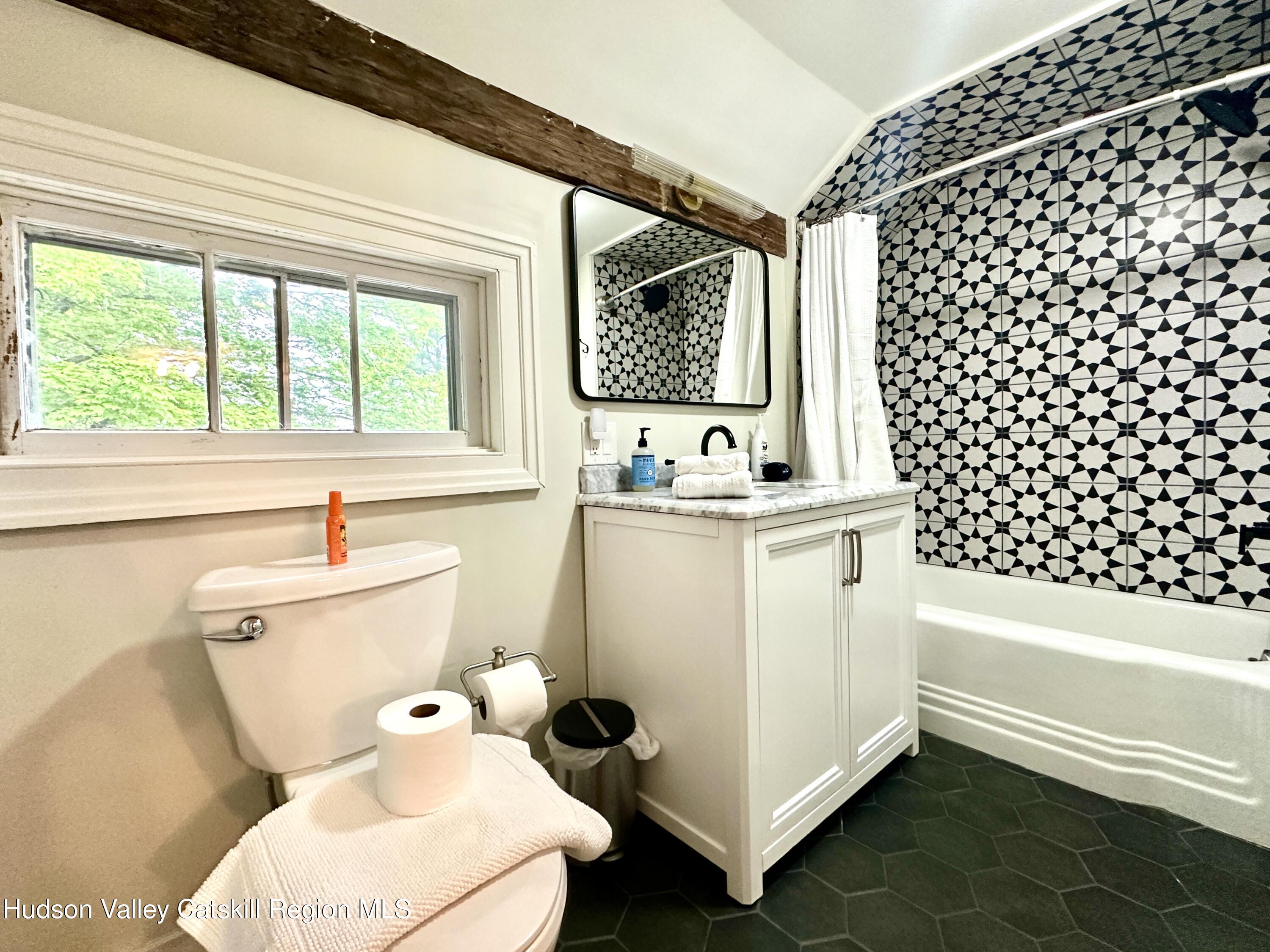 4028 County Rte 26 Greenville, NY 12083 - Photo 29 of 51 a bathroom with a sink toilet vanity and tub