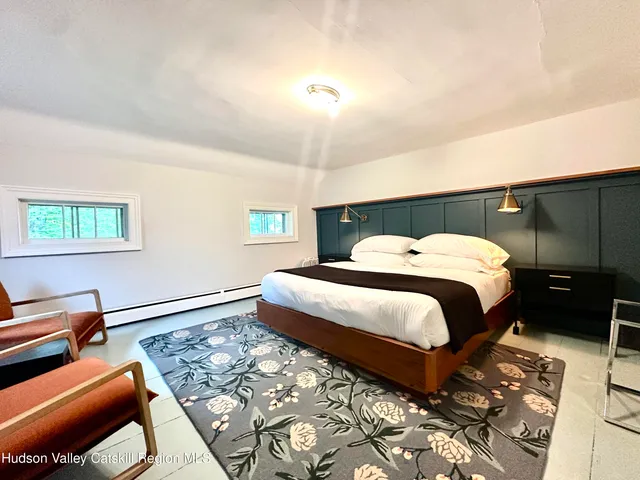 a bedroom with a bed and closet