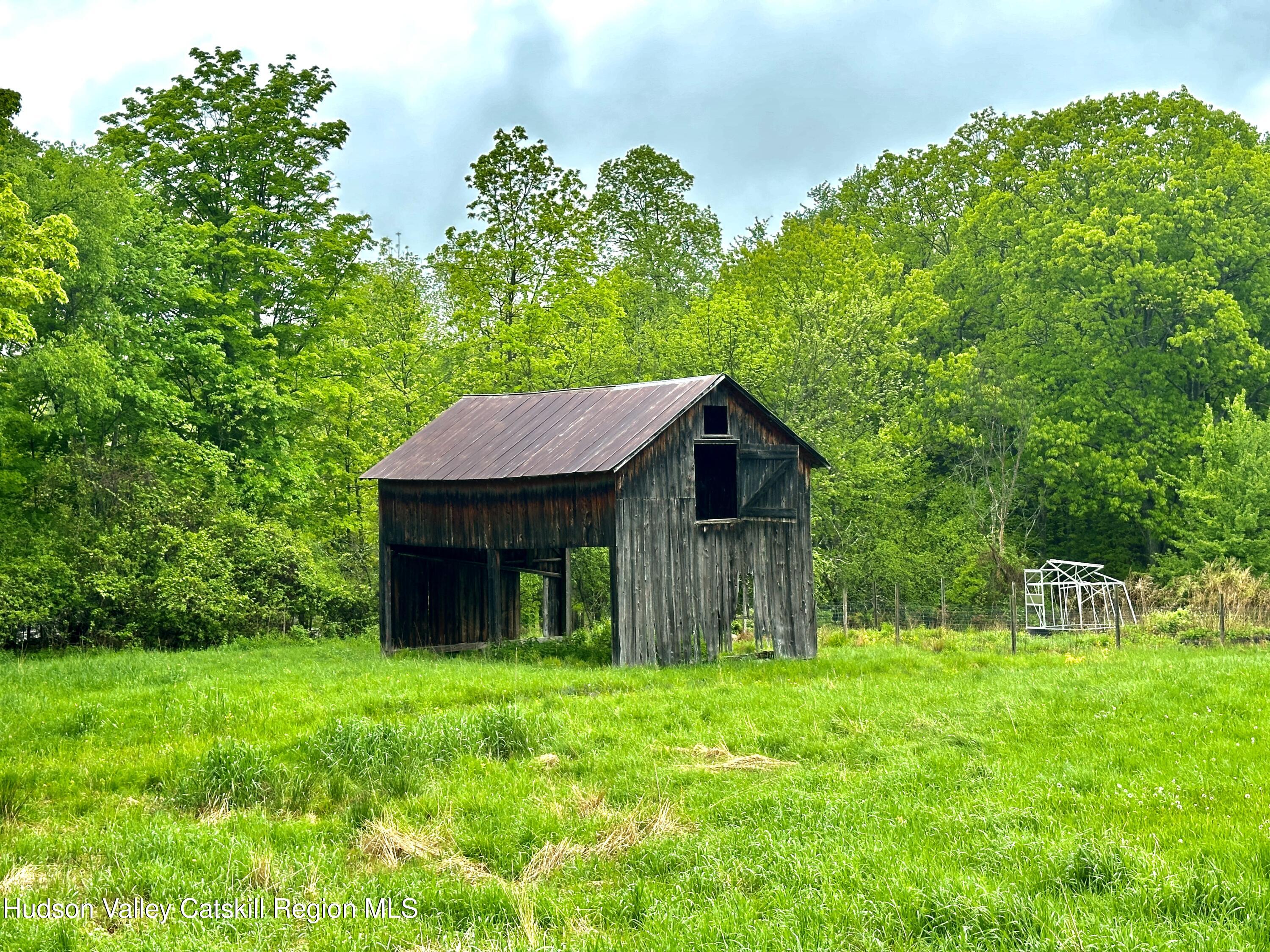 4028 County Rte 26 Greenville, NY 12083 - Photo 47 of 51 a view of a house with yard and a garden
